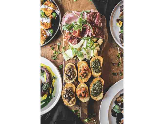 Drive the all-new Ferrari Purosangue for the day, and enjoy lunch at Mangia Tuscano