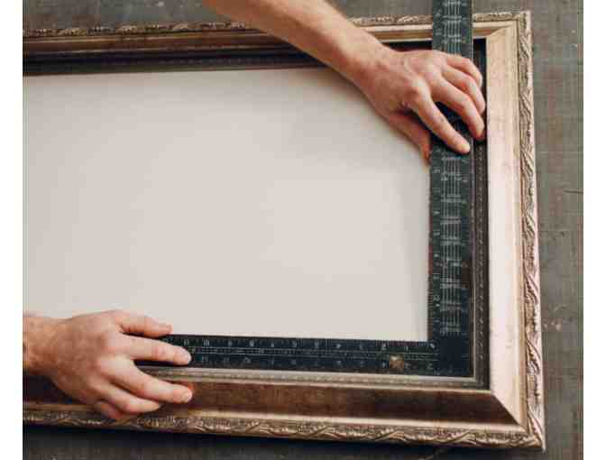 $50 towards framing services