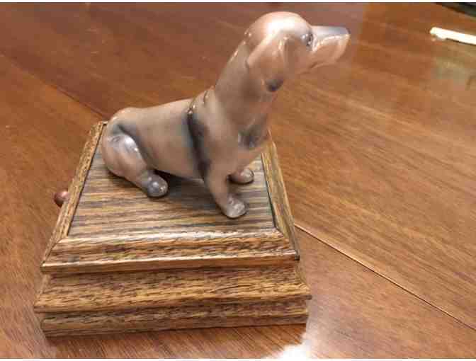 Music box!  Sitting doxie on top playing Impossible Dream!  Vintage!