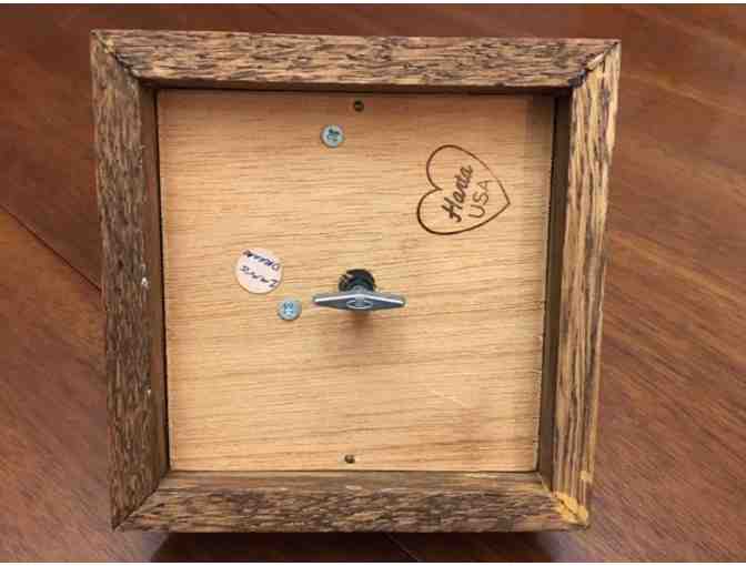 Music box!  Sitting doxie on top playing Impossible Dream!  Vintage!