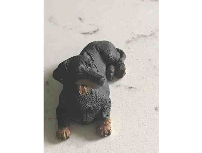 Laying down Dachshund Figurine