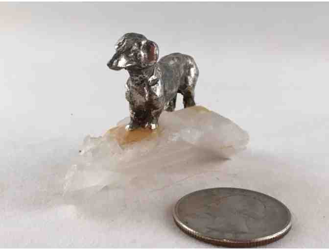 Metal Dachshund Sitting on Piece of Quartz