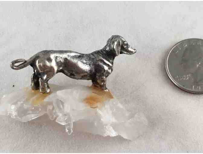 Metal Dachshund Sitting on Piece of Quartz