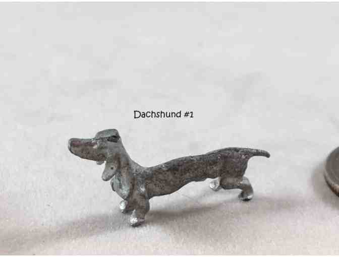 Four pewter / metal miniature dachshund figurines~~ Vintage! ~~ Highly collectible!