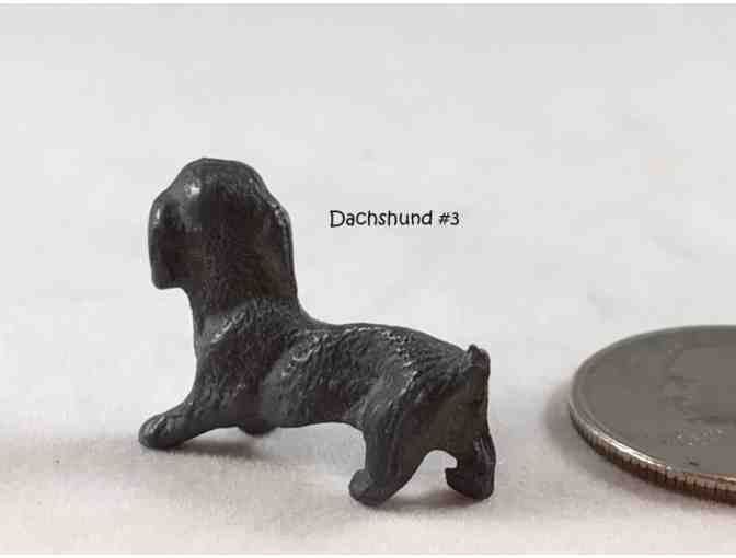 Four pewter / metal miniature dachshund figurines~~ Vintage! ~~ Highly collectible!