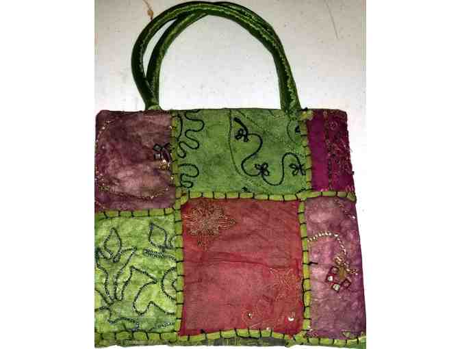 Young ladies cloth purse with three note pads