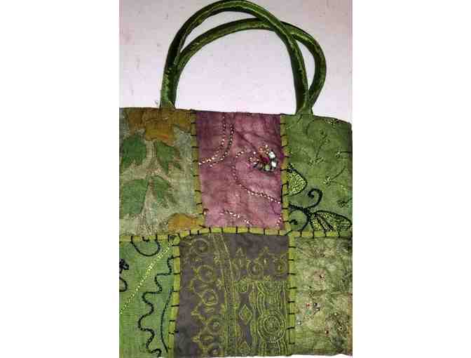 Young ladies cloth purse with three note pads