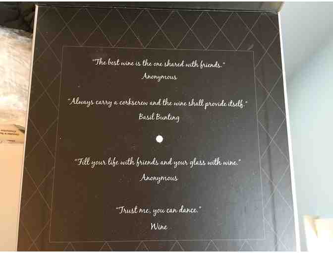 Wine Opener plus 2 dog charms and foil cutters!  Perfect hostess gift!