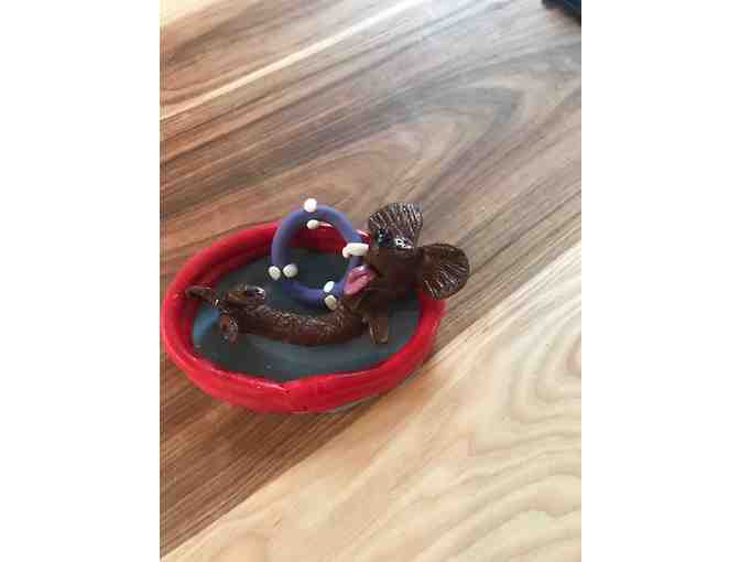 Adorable Handmade Dachshund Figurine in pool