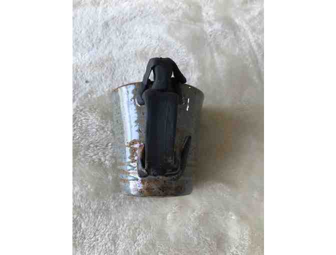 Handmade pottery coffee mug with dachshund handle