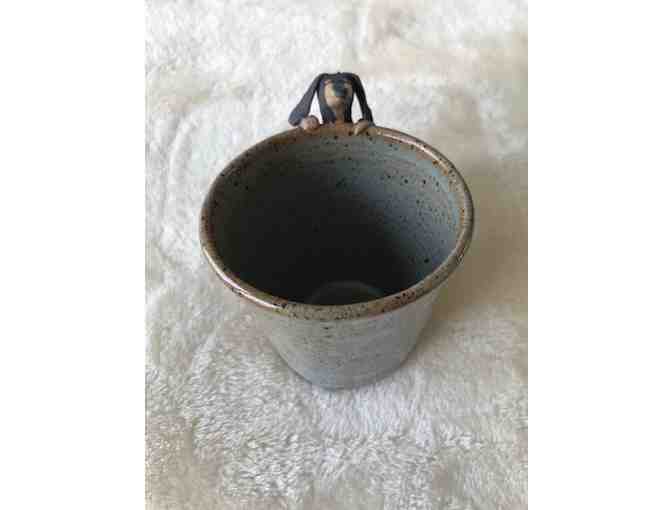 Handmade pottery coffee mug with dachshund handle