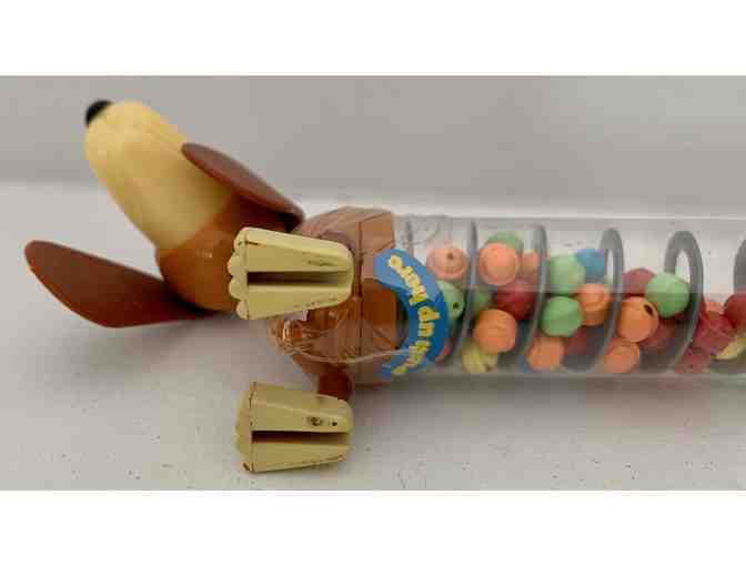 Candy Dispenser?? Adorable dachshund with candies!