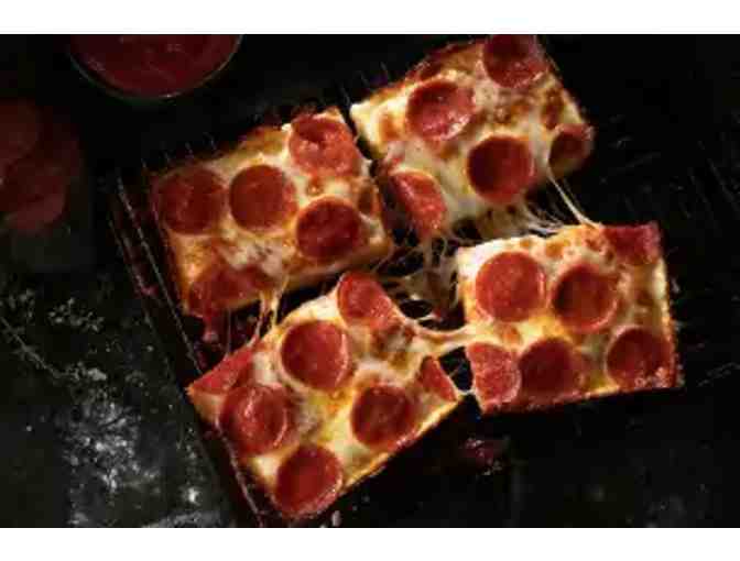 One Jets Four Corner Pizza with Premium Mozzerella and one topping