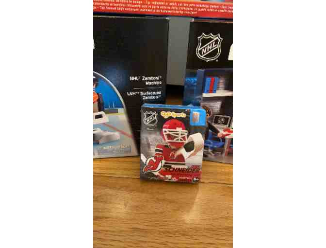 LOT OF PLAYMOBILE HOCKEY THEMED TOYS.