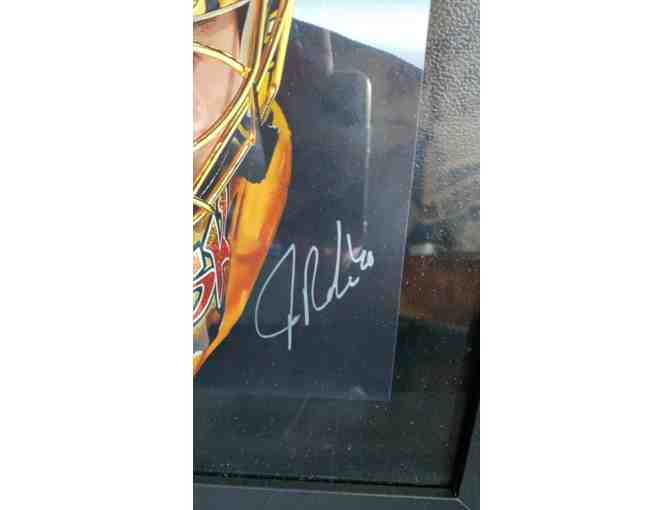 PHOTO OF TUUKKA RASK. AUTOGRAPHED AND FRAMED .
