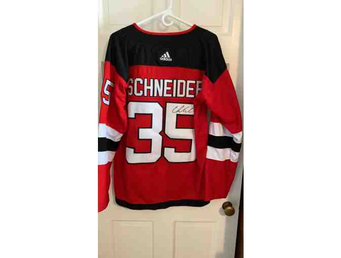 AUTOGRAPHED RED NJ DEVILS SIZE 50 NHL JERSEY #35 CORY SCHNEIDER