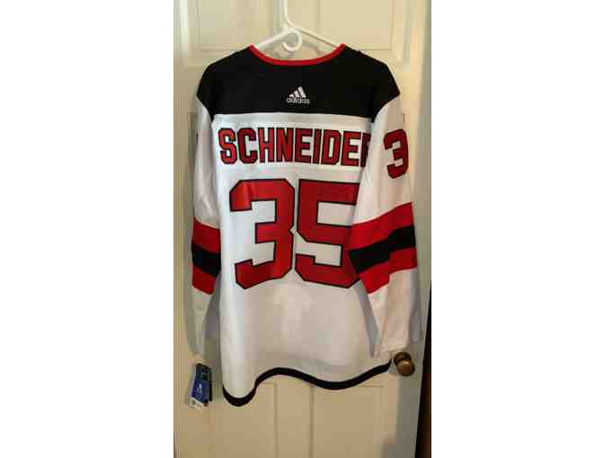 AUTOGRAPHED WHITE NJ DEVILS SIZE 52 NHL JERSEY #35 CORY SCHNEIDER