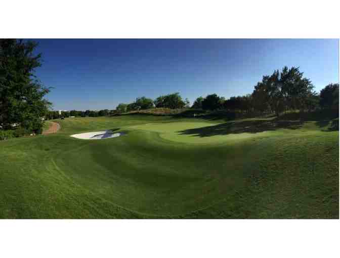 TPC Four Seasons Golf & Sports Club Dallas at Las Colinas - a foursome with carts