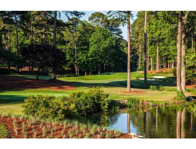Reynolds Lake Oconee -- A foursome with carts and range balls
