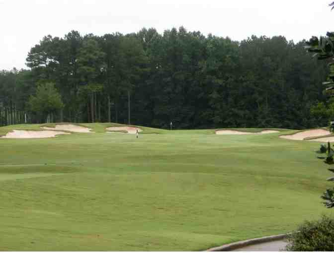 The Frog Golf Club -- One foursome with carts, meals and range balls