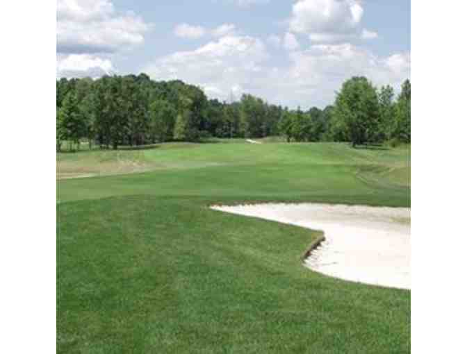 Ellsworth Meadows Golf Club -- A foursome with range balls