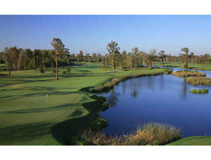 TPC Louisiana - One foursome with carts and range balls