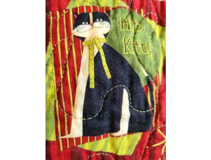 Handmade holiday table runner with black cats