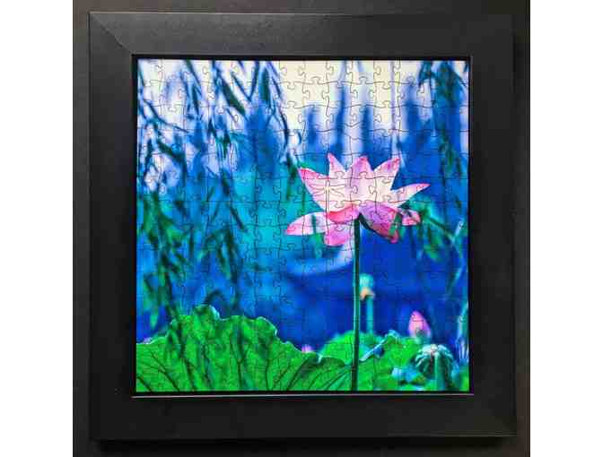 Two hand-crafted wooden puzzles and puzzle tray