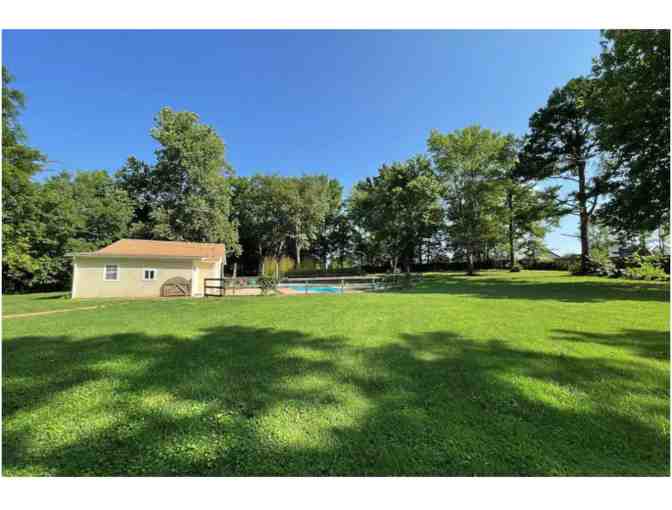 AirBnB stay at 'Cozy Cottage with firepit and pool' in Fayetteville