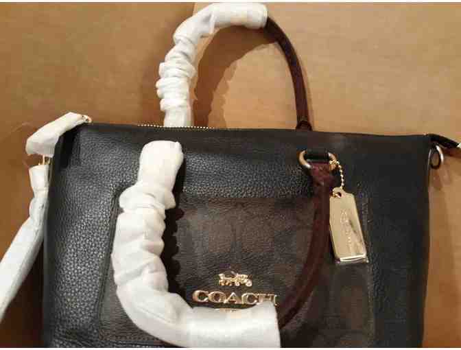 Designer Coach black with brown trim purse