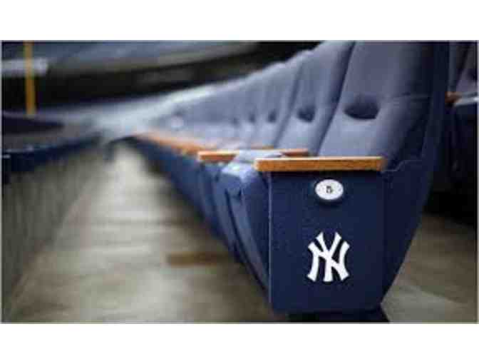 '4 Front Row Yankees Legends Tickets right next to the visitors' dugout!'
