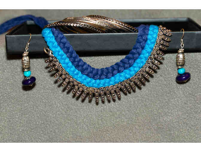 Oxidized silver in blue thread