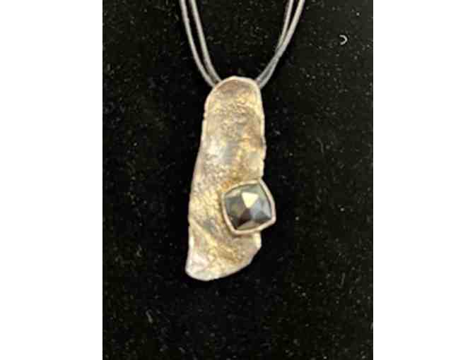 Israeli silver with topaz stone on double black cord necklace