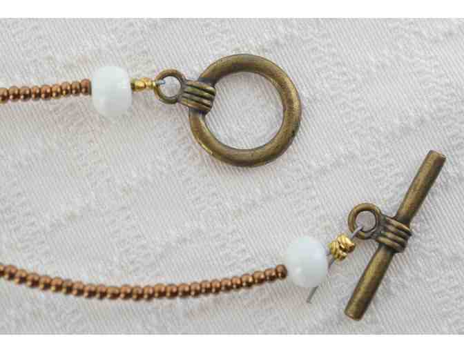 White Venetian Glass with gold foil swirls and glass gold tone beads Necklace