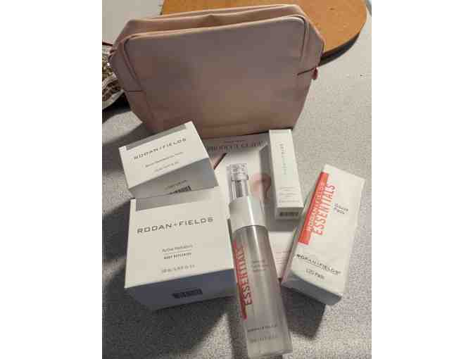 Rodan + Fields - Pink Makeup Bag with RF Face Products