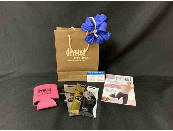 Sundays Sun Spa Shop - Gift Bag:  Gift Certificate for free month of tanning and lotions