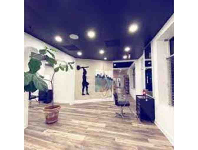 Edward Johnson Salon - Value: $250 Donated by: Emilie Kennedy and The 2nd Grade Class