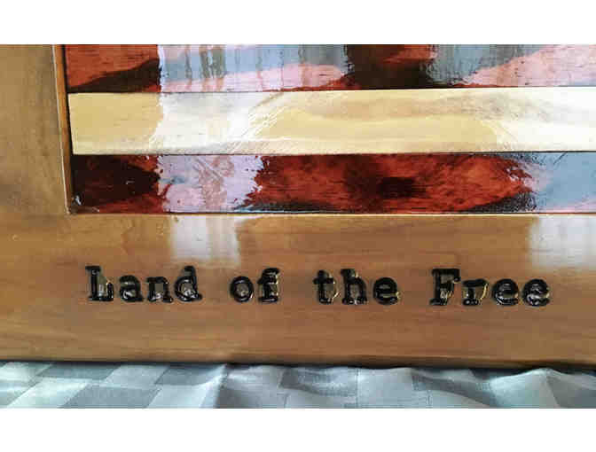 US flag art made from wood fragments reclaimed from Easton reconstruction projs.