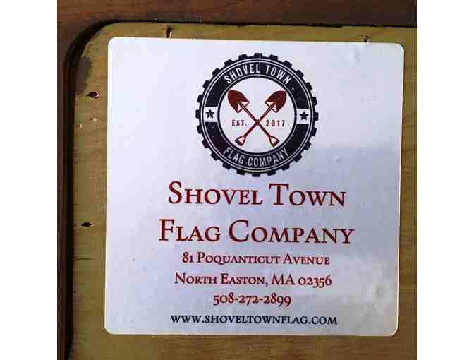 US flag art made from wood fragments reclaimed from Easton reconstruction projs.