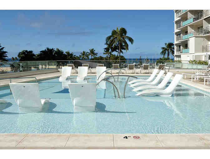 Enjoy 5 nights @ Honolulu Ilikai Hotel & Luxury Suites w/ Surf Lesson + Food Credit