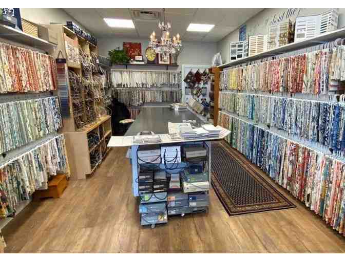 $500 Gift Certificate and Custom Decorative Pillow donated by Cloth Interiors