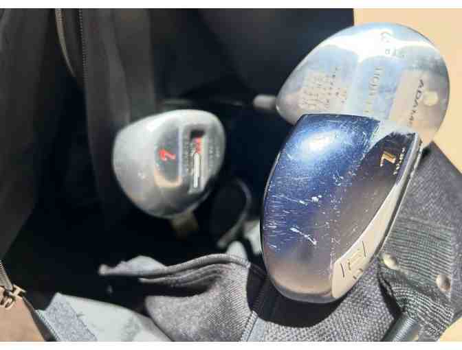 Wheeled Golf Travel Bag with assorted clubs