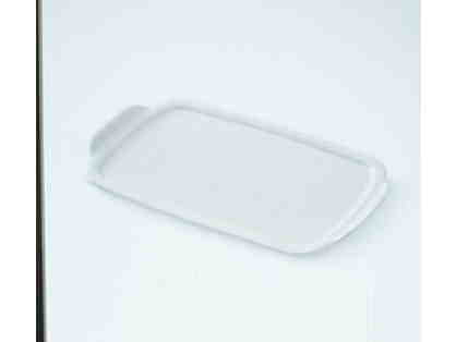 It is a lid, cooking tray, or serving tray!