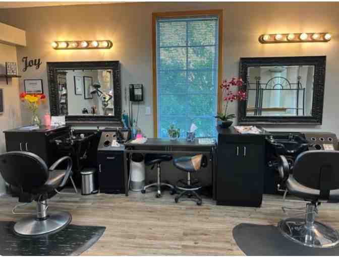 Full Service Haircut from Christine at Escape Tanning and Salon