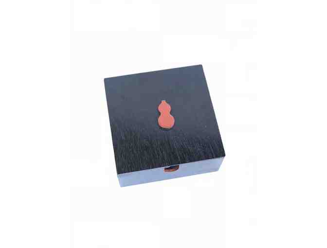 Small Blue Plates in Black Box