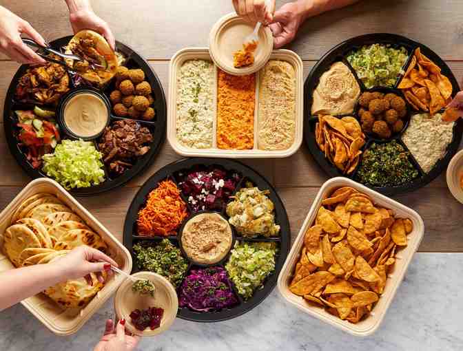 Enjoy a catered meal for 8 people with Yalla Mediterranean