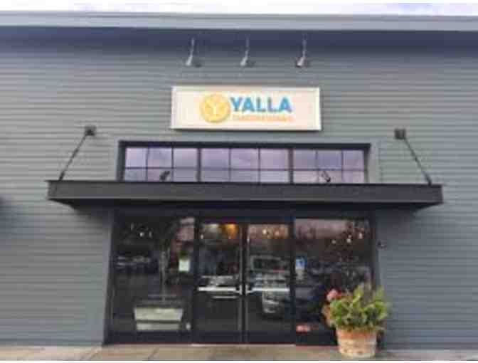 Enjoy a catered meal for 8 people with Yalla Mediterranean