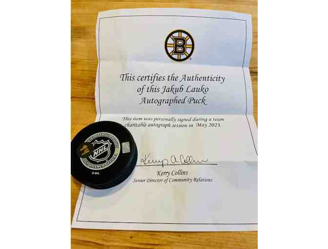 Boston Bruins - Jakub Lauko Autographed Hockey Puck