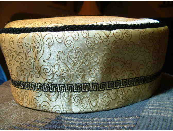 Golden brocade kippah trimmed in black