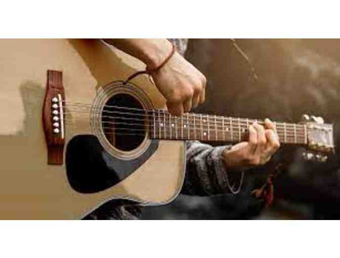 One Month of Free Lessons at the Guitar Center in Highland Park